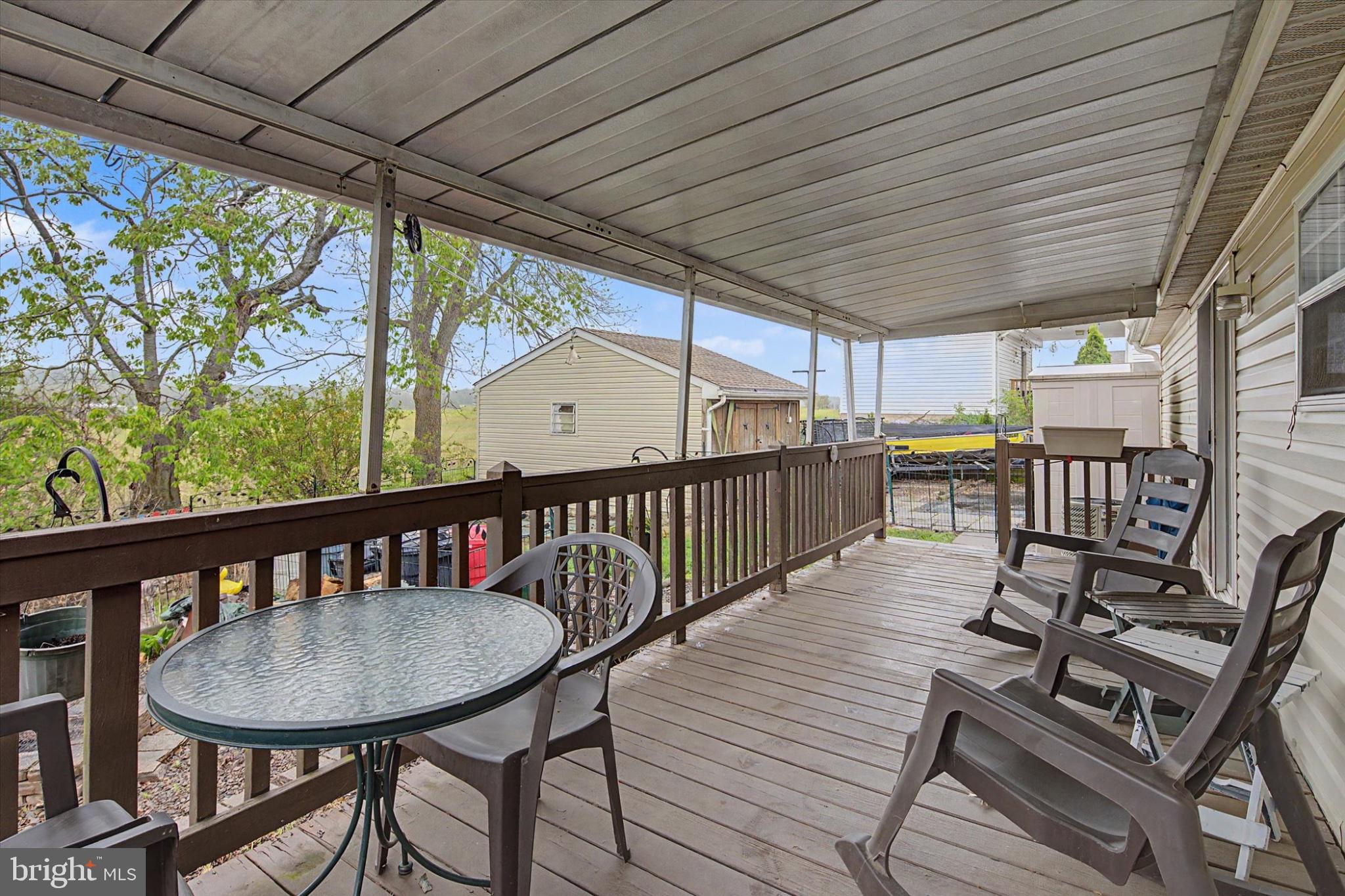 16 Ray Drive Denver, PA 17517 - Photo 18 of 20 a view of a balcony with furniture and wooden floor