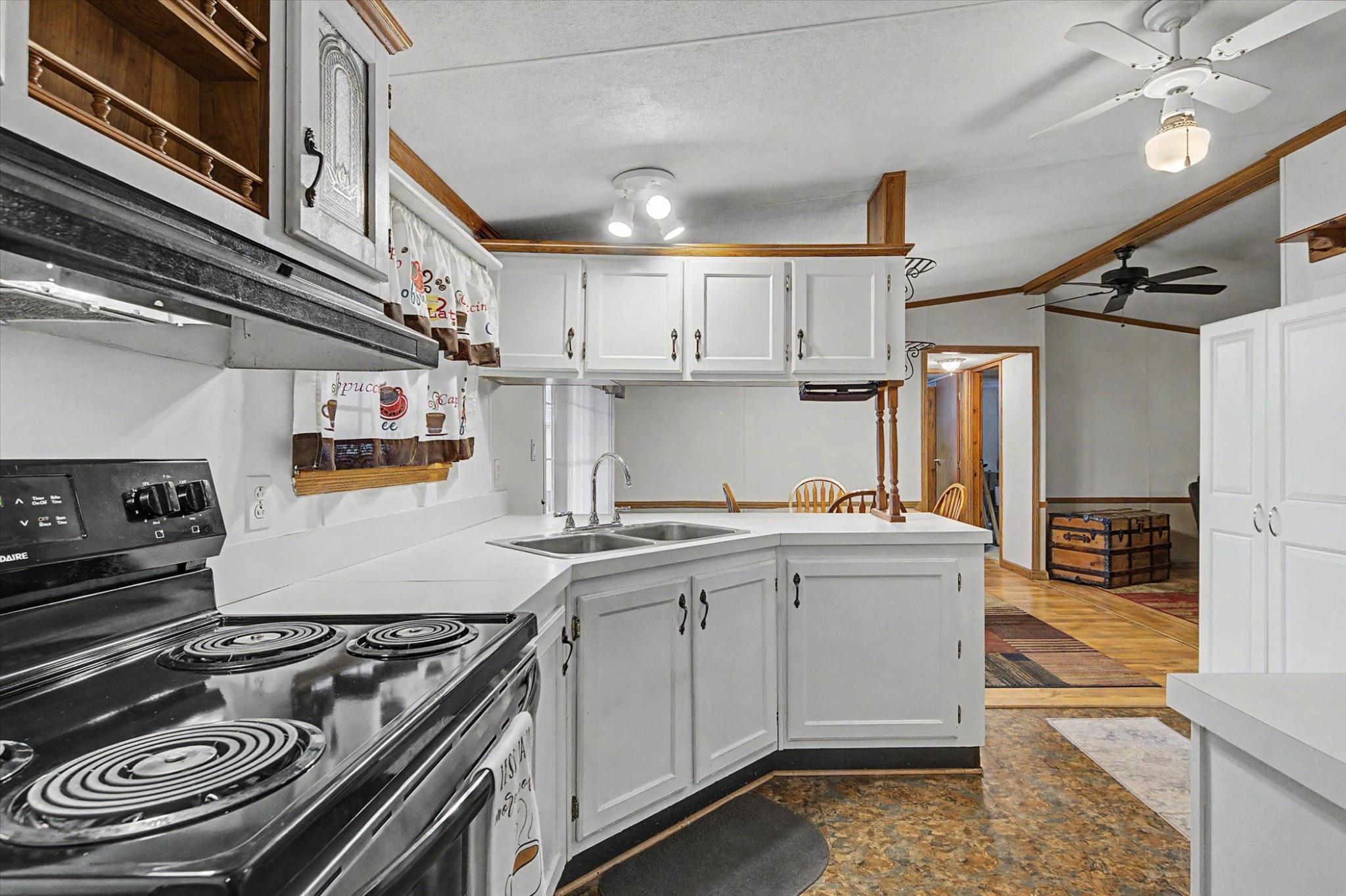 16 Ray Drive Denver, PA 17517 - Photo 5 of 20 a kitchen with stainless steel appliances granite countertop a stove and a sink