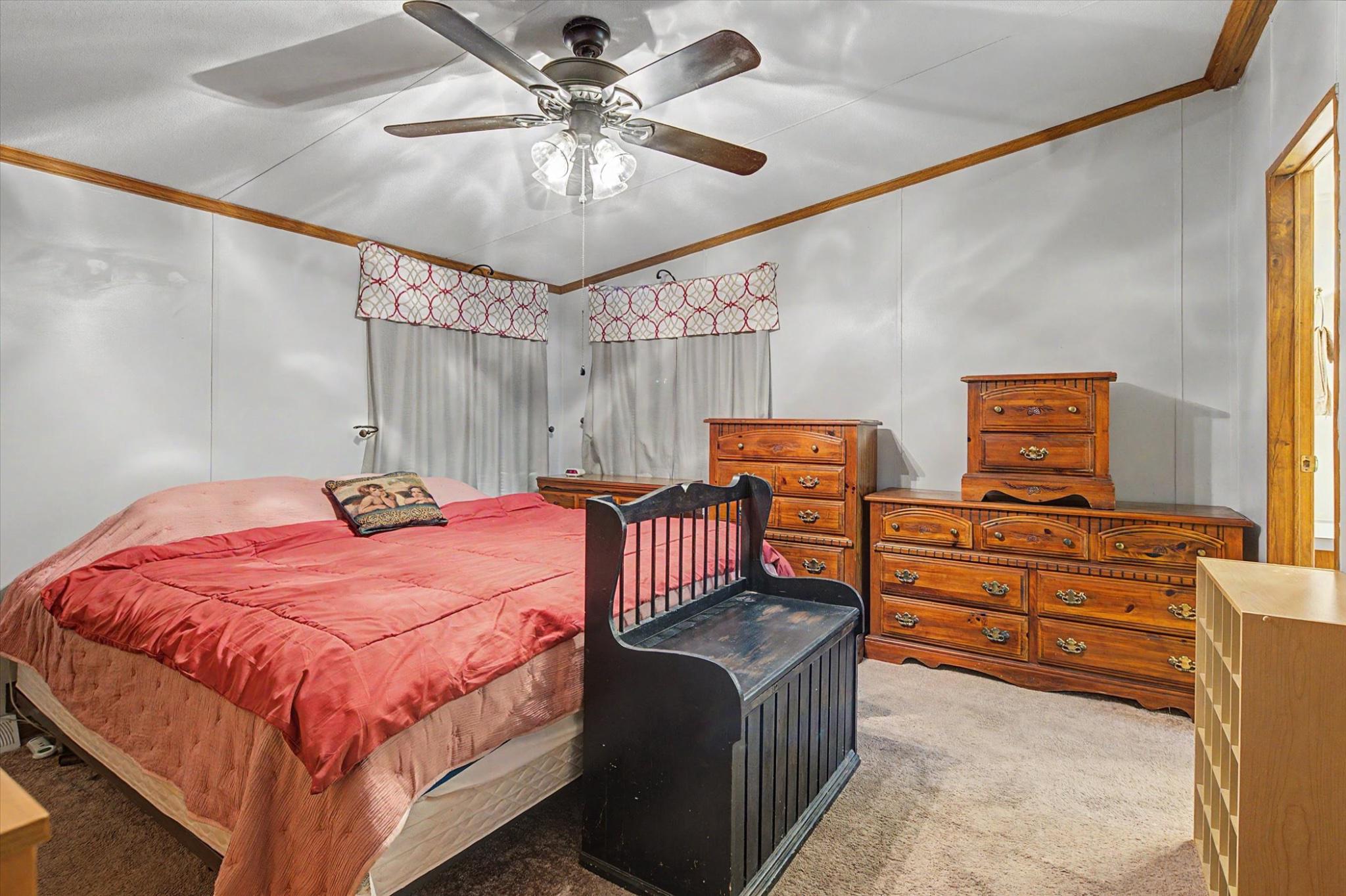 16 Ray Drive Denver, PA 17517 - Photo 9 of 20 a bedroom with a bed dresser and wooden floor