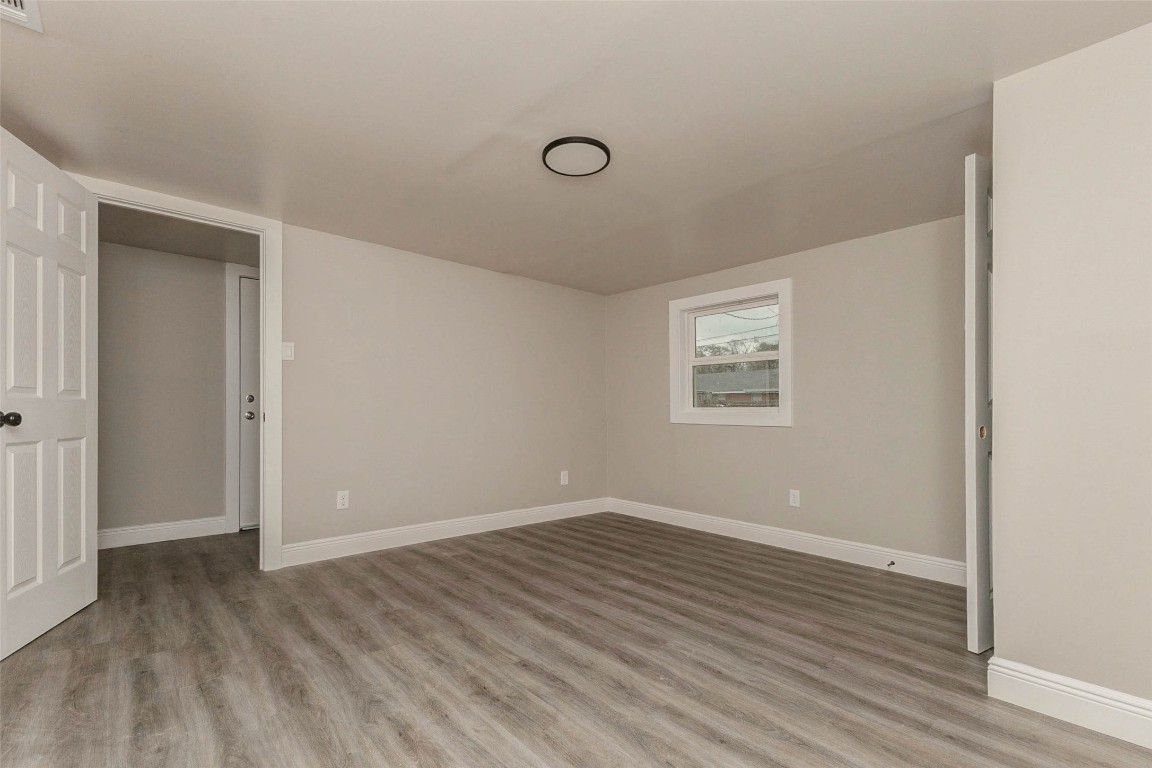 511 Wagers Street Conroe, TX 77301 - Photo 16 of 39 wooden floor in an empty room