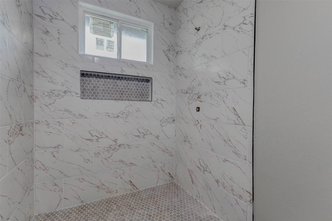 511 Wagers Street Conroe, TX 77301 - Photo 23 of 39 a bathroom with shower