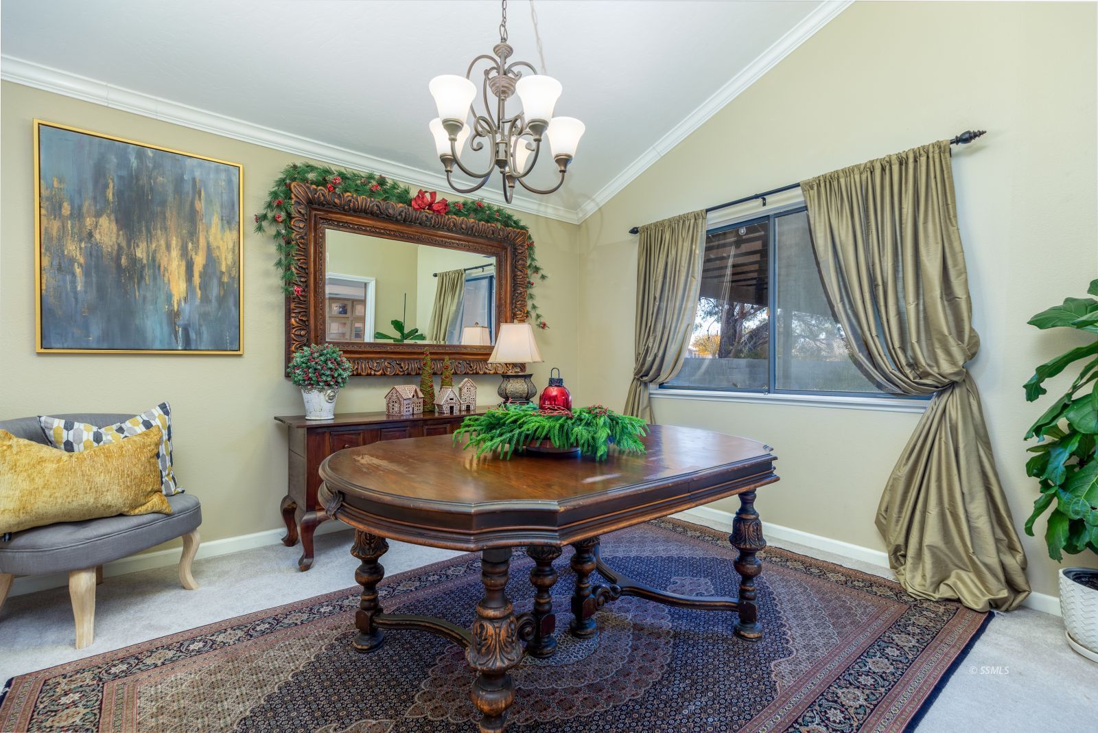 815 Hurschell Avenue Ridgecrest, CA 93555 - Photo 8 of 43 a dining room with furniture a chandelier and wooden floor
