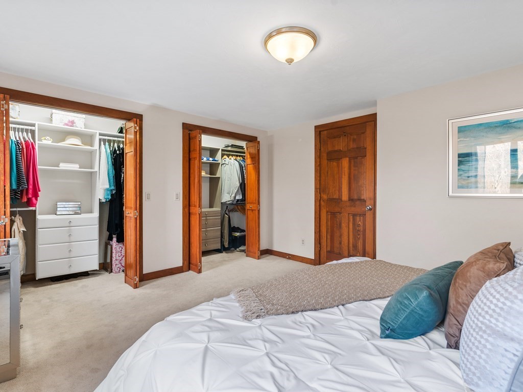 8 Moorland Road, Unit 3 Gloucester, MA 01930 - Photo 16 of 38 a bedroom with bed and a large window