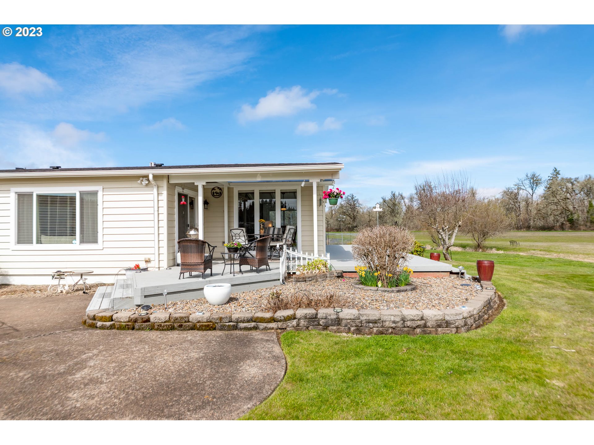 85721 Hampstead Lane Eugene, OR 97405 - Photo 13 of 45 a view of a house with backyard and sitting area