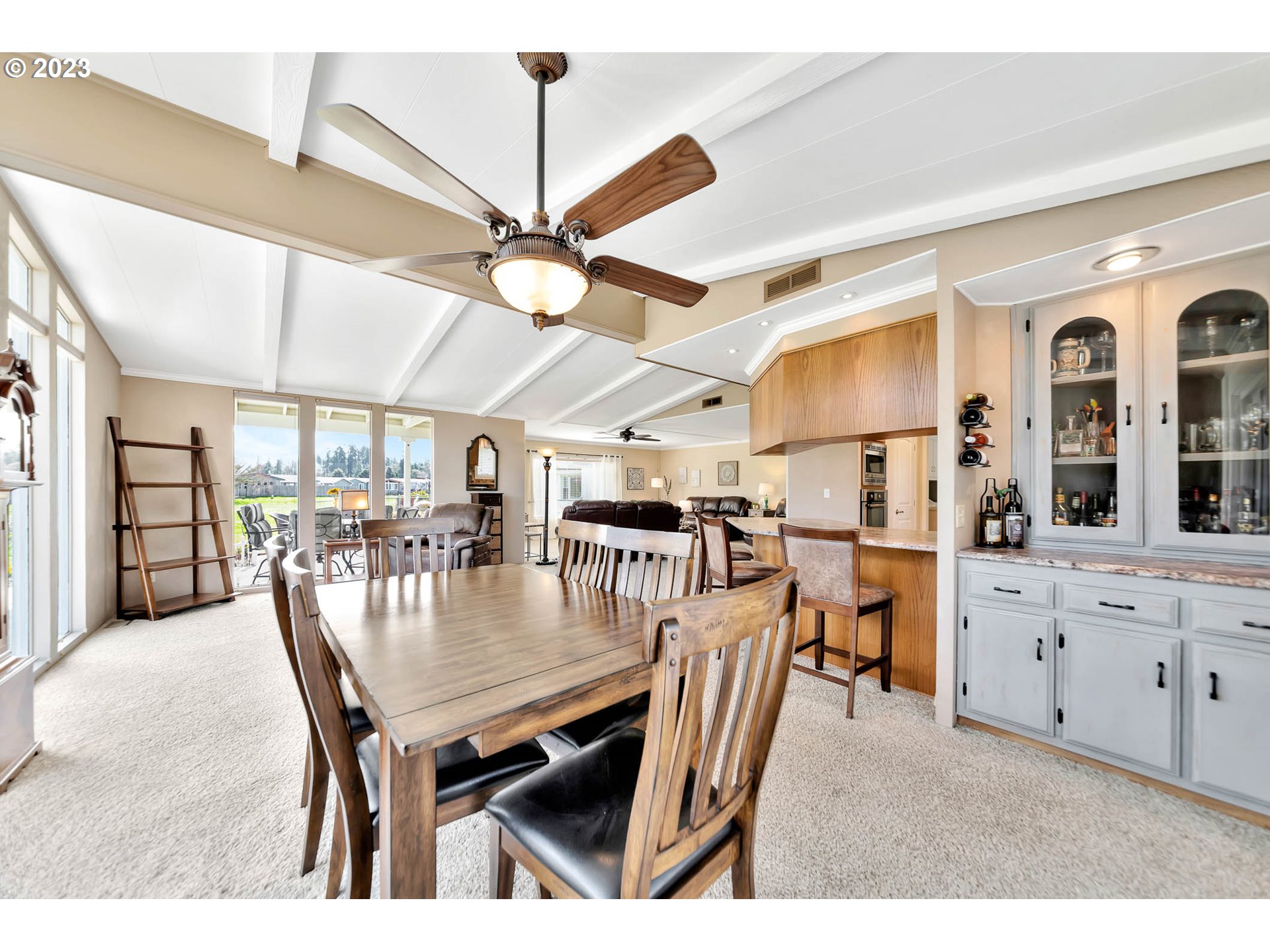 85721 Hampstead Lane Eugene, OR 97405 - Photo 20 of 45 a dining room with lots of wooden furniture