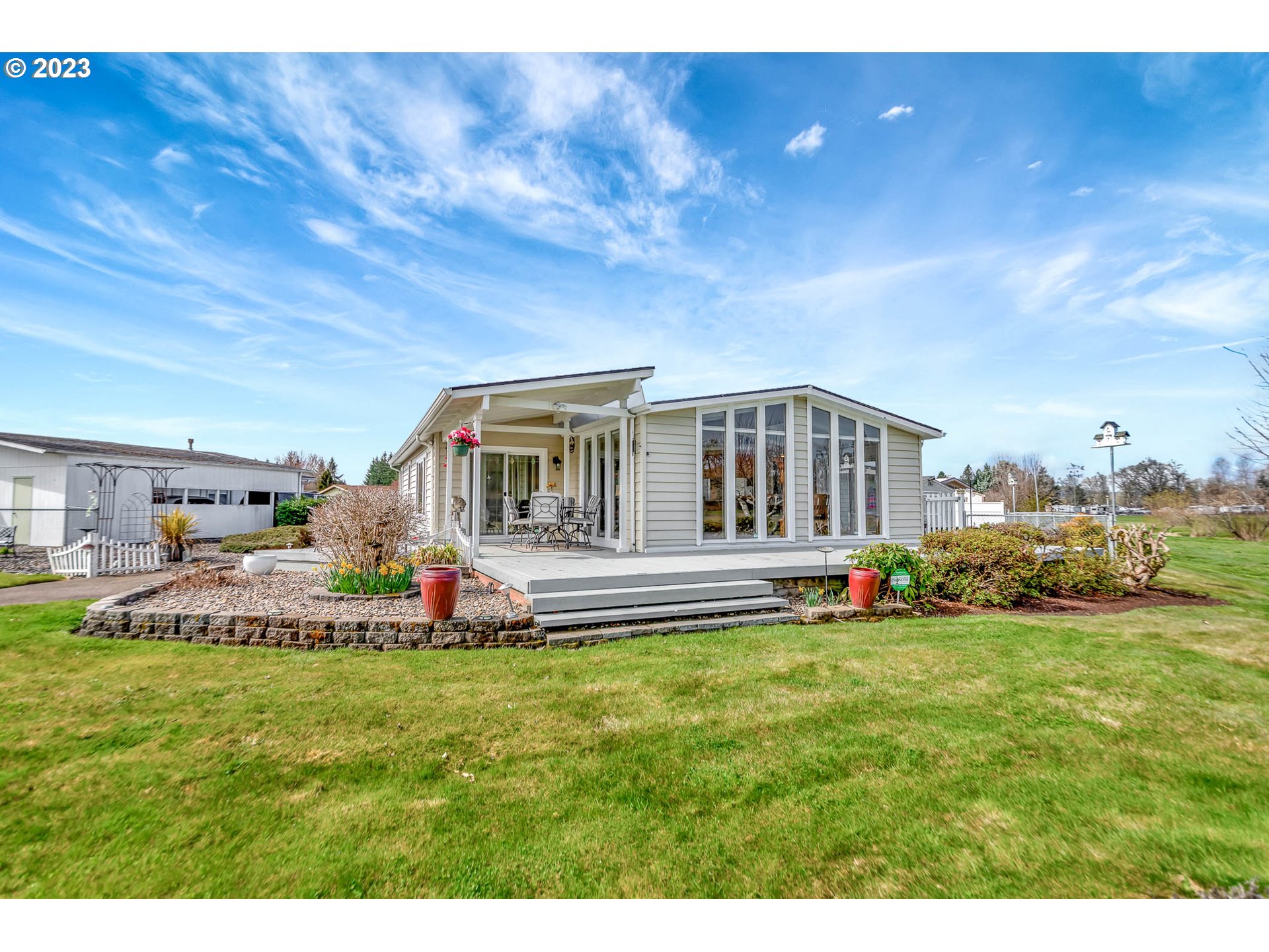 85721 Hampstead Lane Eugene, OR 97405 - Photo 2 of 45 a house view with a sitting space and garden