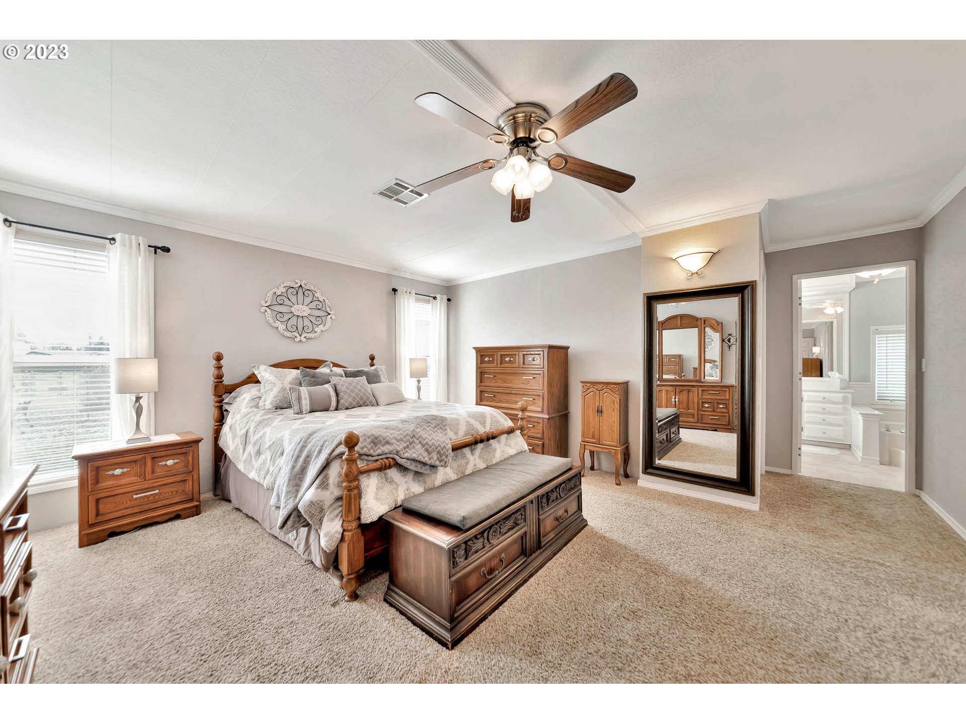 85721 Hampstead Lane Eugene, OR 97405 - Photo 26 of 45 a spacious bedroom with a bed and glass walk in closet