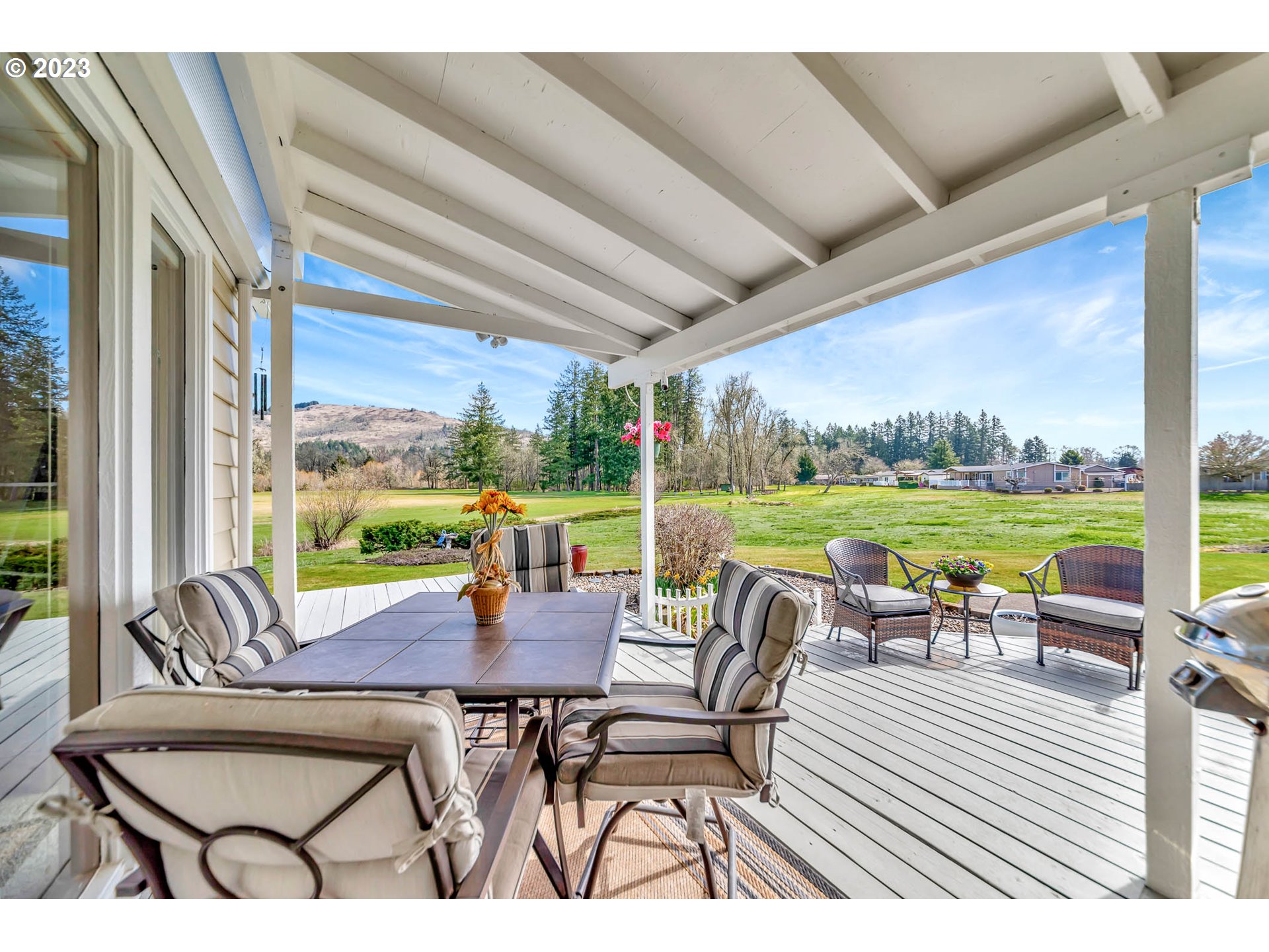 85721 Hampstead Lane Eugene, OR 97405 - Photo 3 of 45 a view of a patio with dining table and chairs