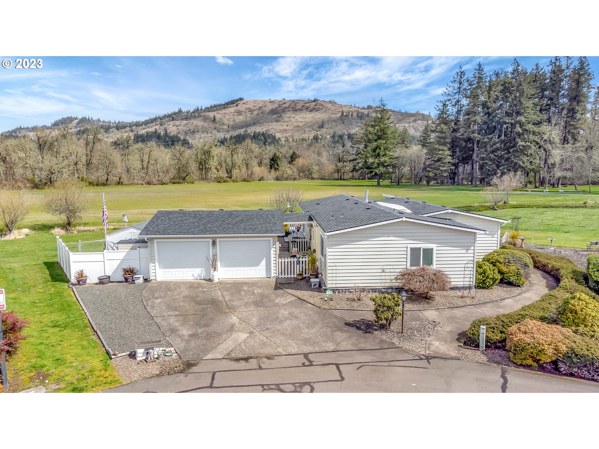 85721 Hampstead Lane Eugene, OR 97405 - Photo 34 of 45 a aerial view of a house with a yard and a garden