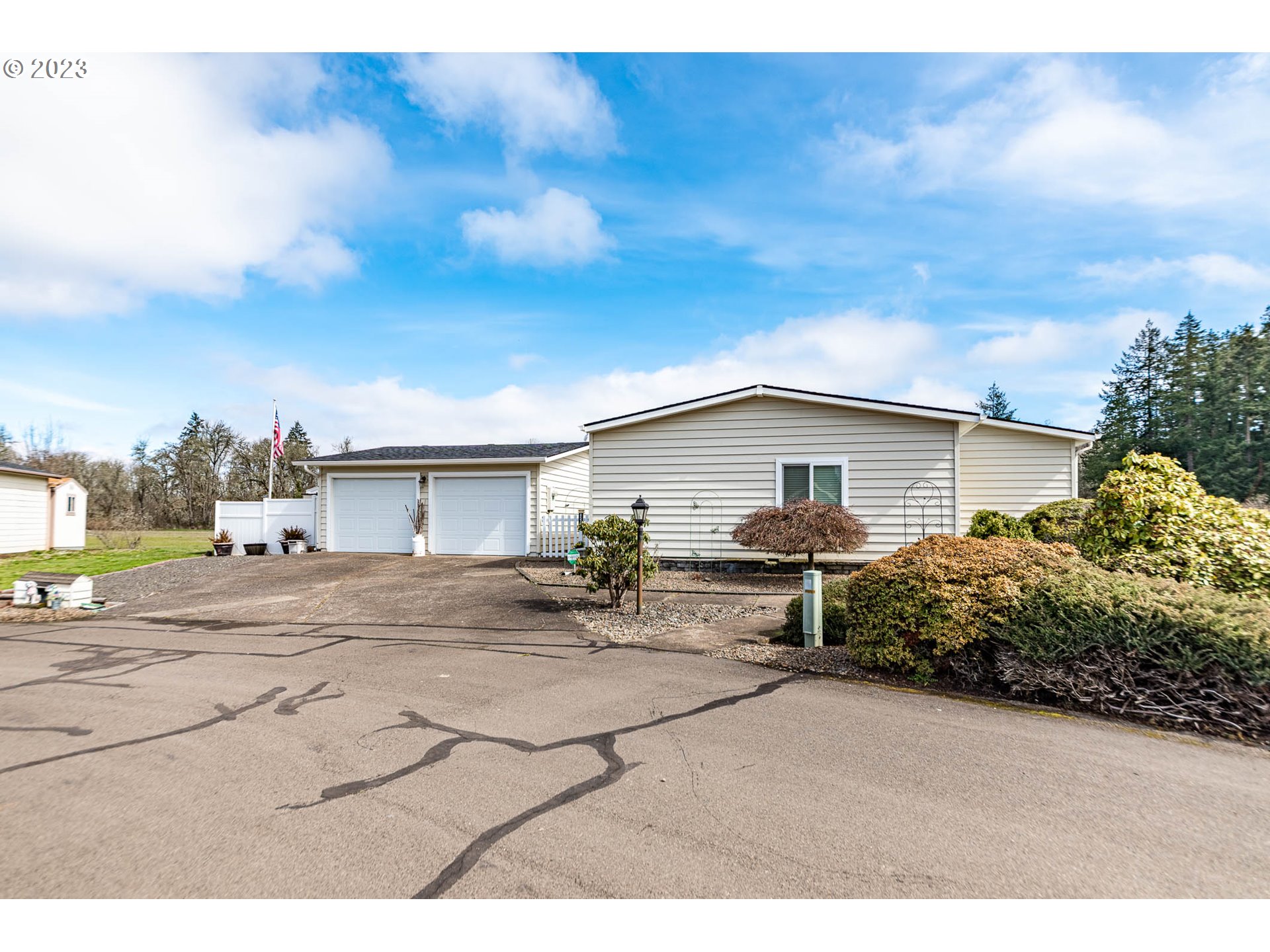 85721 Hampstead Lane Eugene, OR 97405 - Photo 35 of 45 a view of a house with backyard and trees