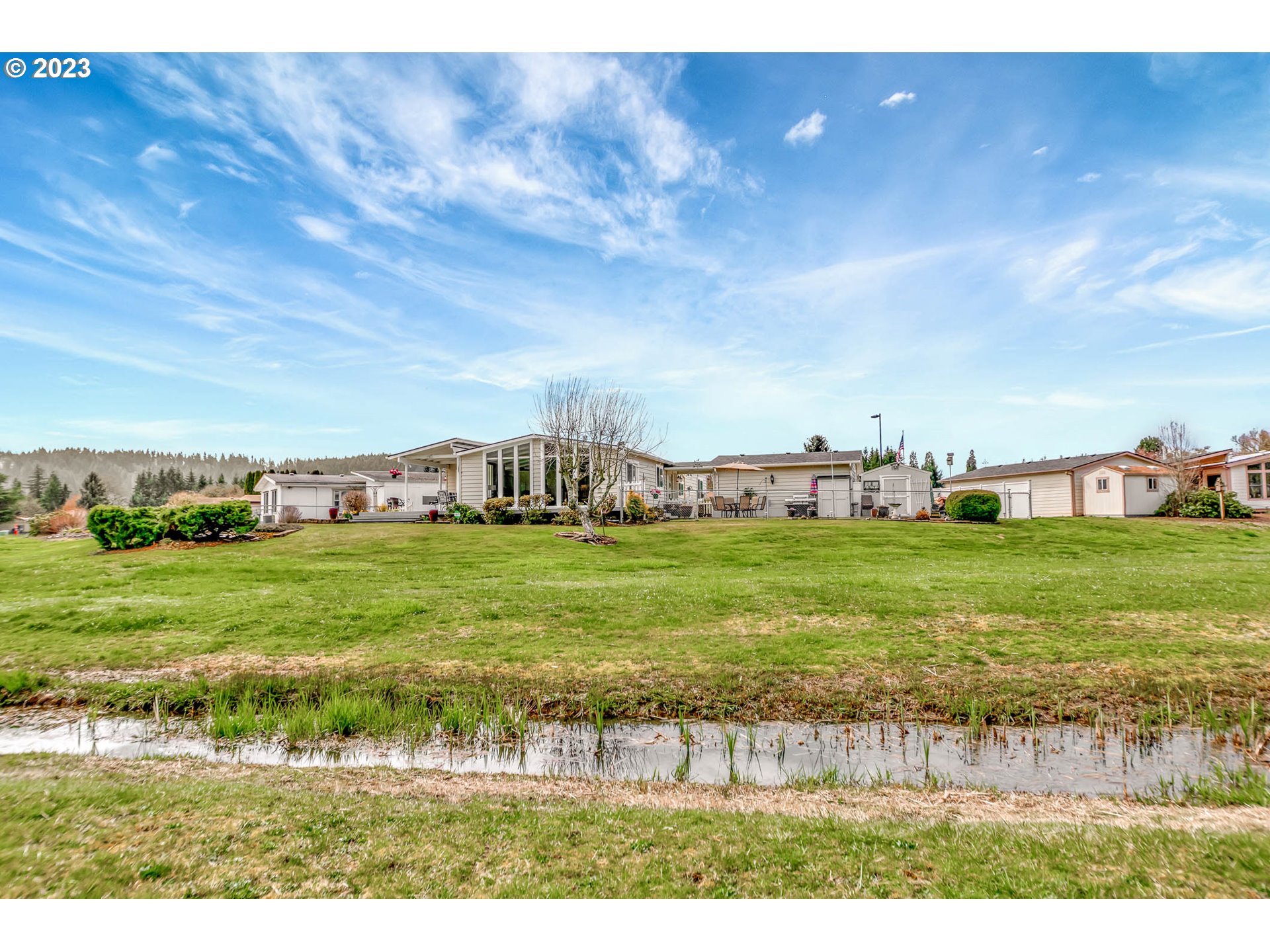 85721 Hampstead Lane Eugene, OR 97405 - Photo 37 of 45 a view of yard with an trees and fence