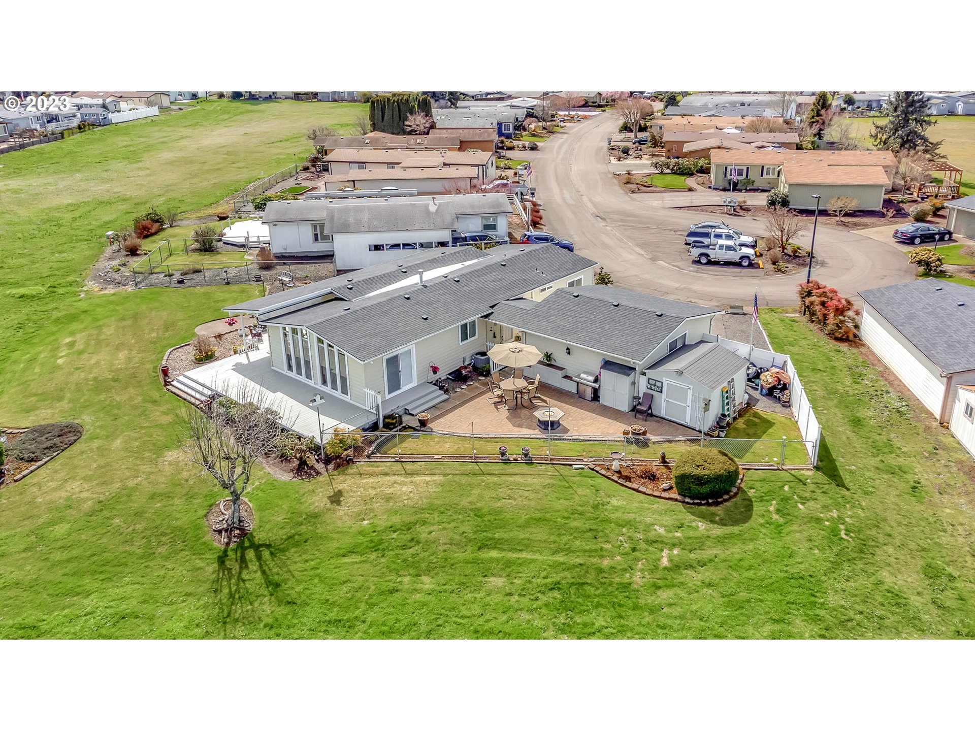 85721 Hampstead Lane Eugene, OR 97405 - Photo 39 of 45 a aerial view of a house with a garden and lake view