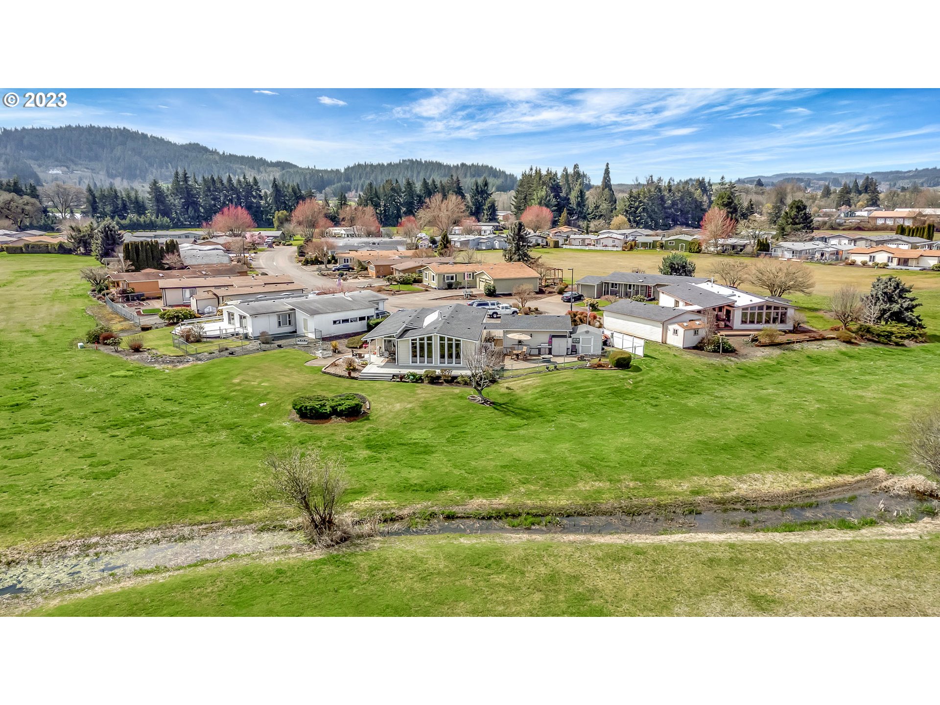 85721 Hampstead Lane Eugene, OR 97405 - Photo 40 of 45 a picture of houses with outdoor view and lake view