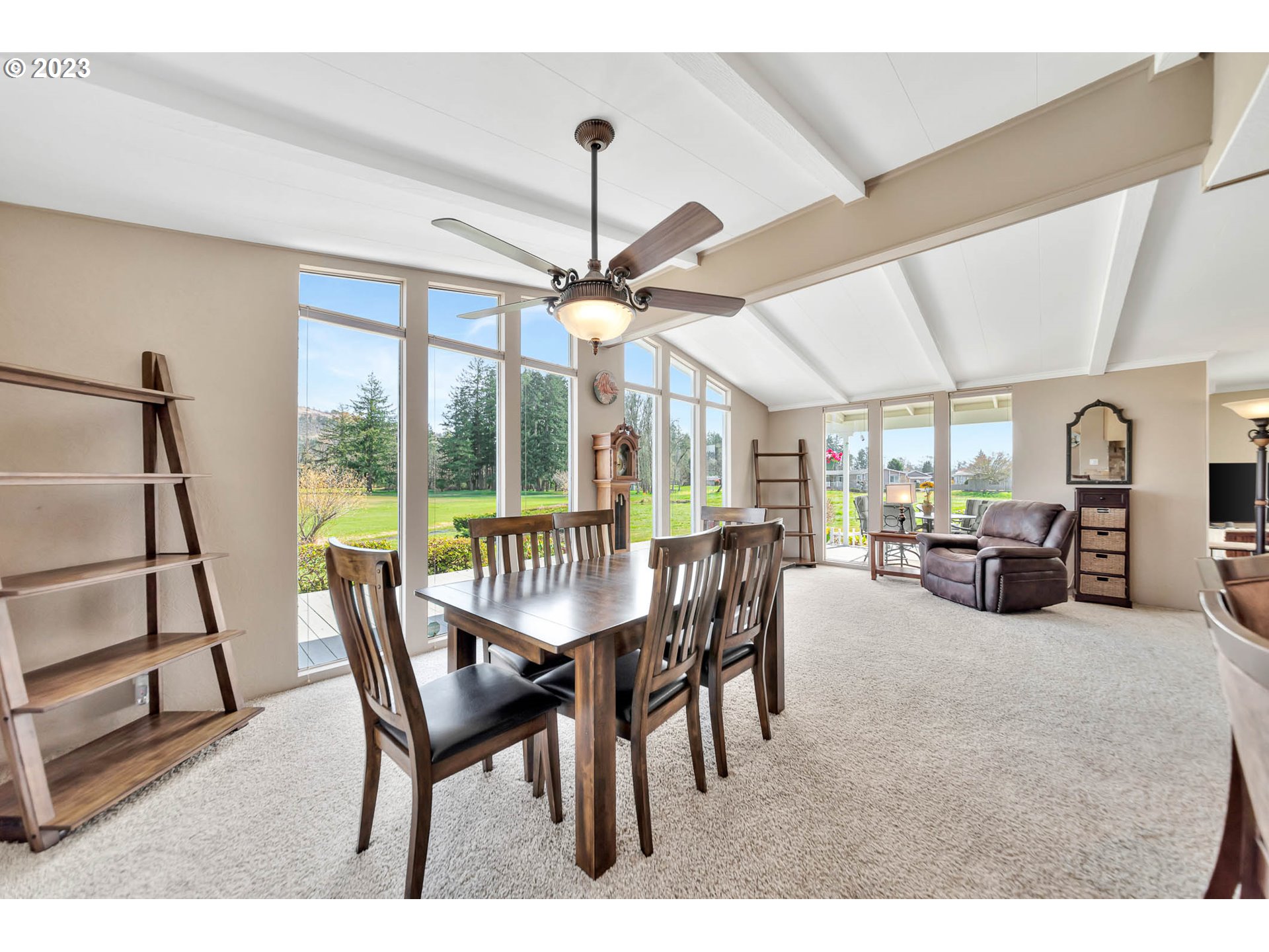 85721 Hampstead Lane Eugene, OR 97405 - Photo 8 of 45 a dining room with furniture and a chandelier