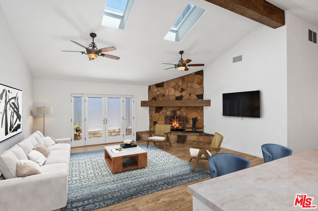 5040 Terramar Way Oxnard, CA 93035 - Photo 5 of 16 a living room with furniture and a flat screen tv