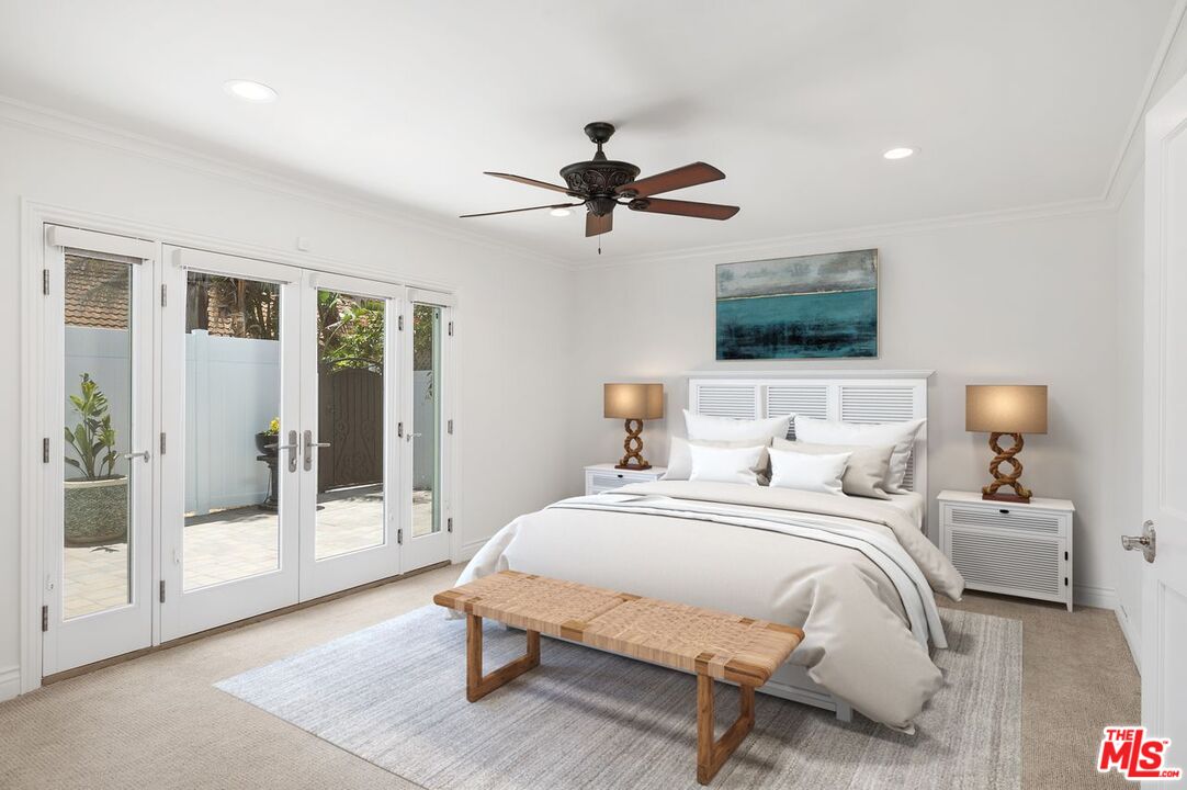 5040 Terramar Way Oxnard, CA 93035 - Photo 7 of 16 a bedroom with double bed and a flat screen tv