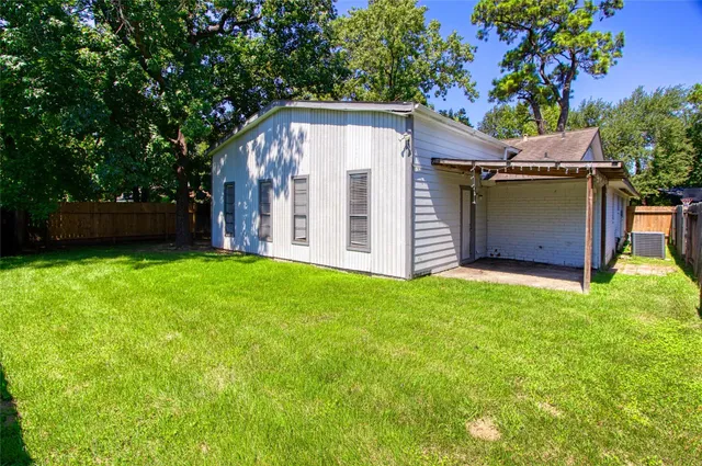 a view of a backyard with a garden