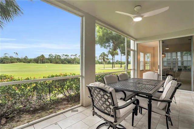 a view of a patio with furniture and wooden floor