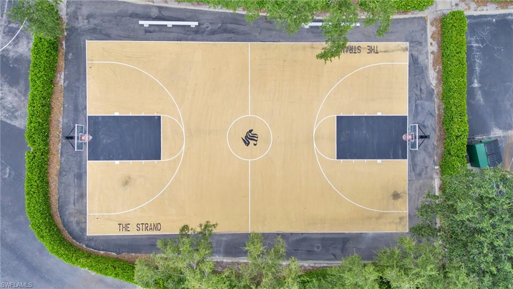 6025 Pinnacle Lane, Unit 602 Naples, FL 34110 - Photo 37 of 43 an aerial view of a house with a swimming pool