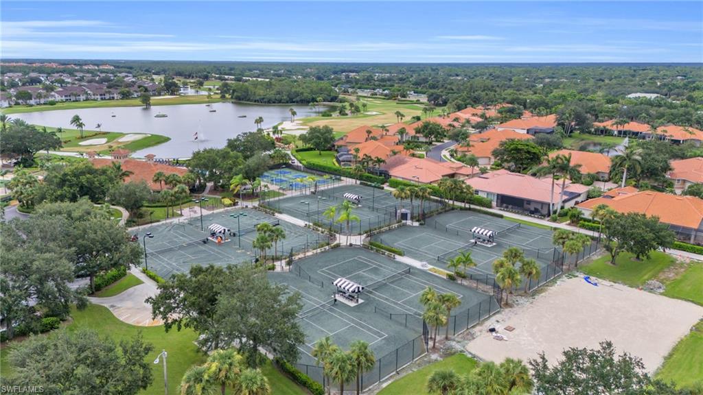 6025 Pinnacle Lane, Unit 602 Naples, FL 34110 - Photo 39 of 43 an aerial view of a city with lots of residential buildings ocean and mountain view in back