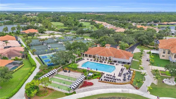 a view of a lake with a yard