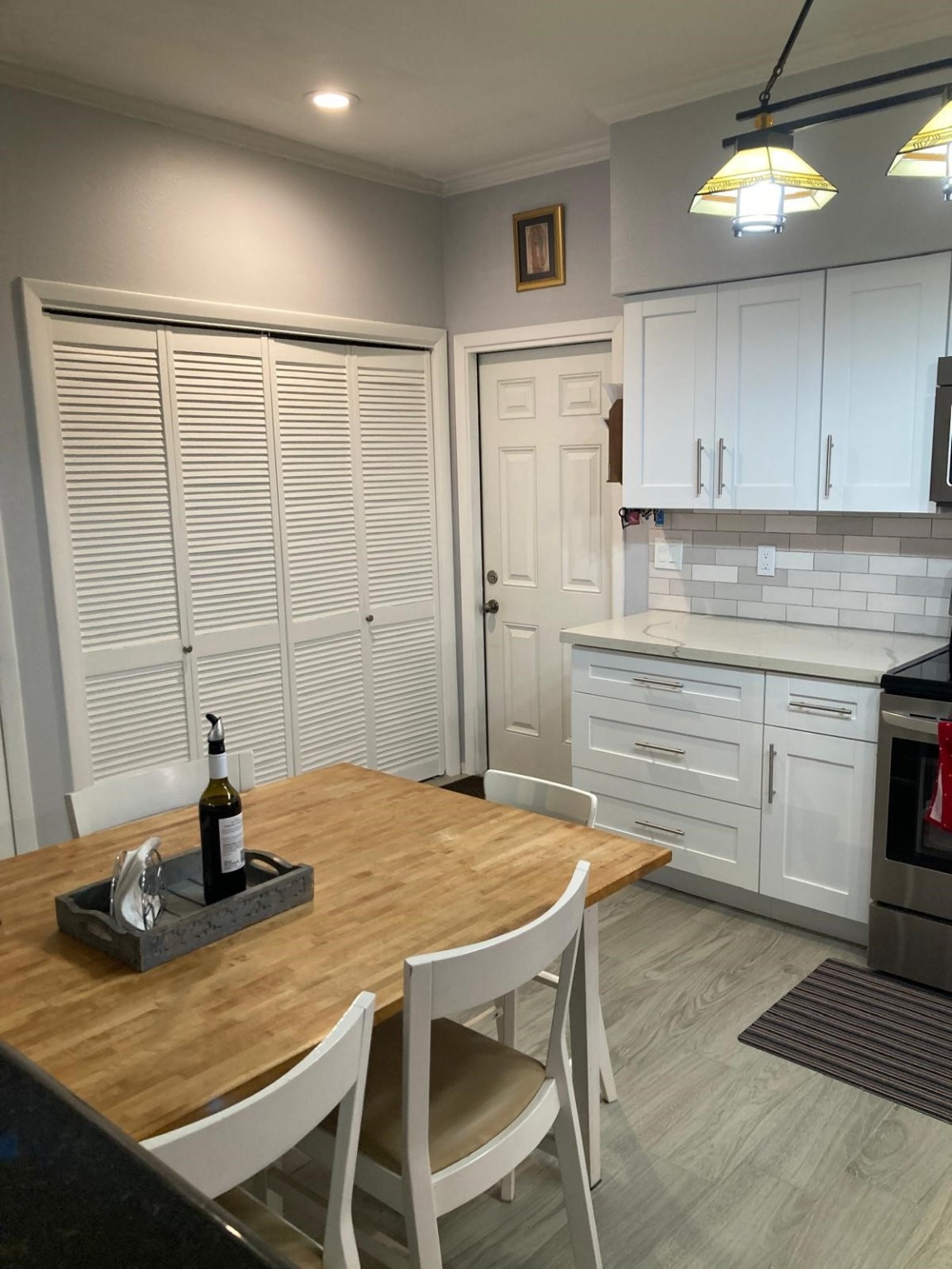 1623 Prairie Grove Drive Houston, TX 77077 - Photo 22 of 50 a kitchen with a table and chairs in it