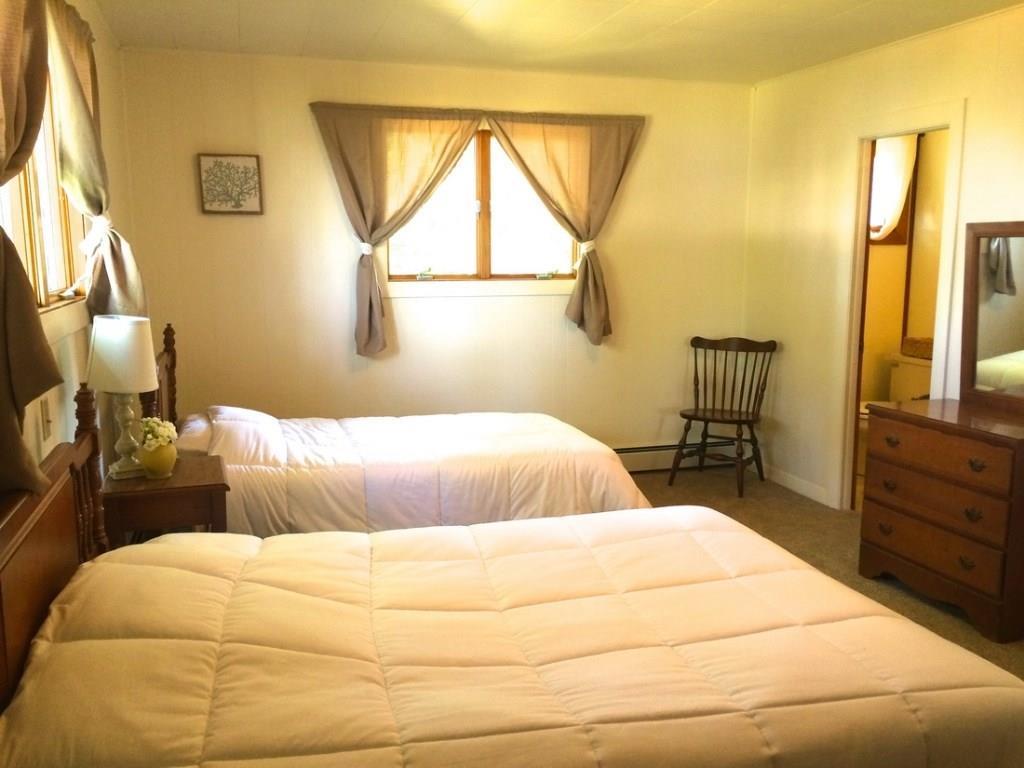 202 Little Deer Isle Road Little Deer Isle, ME 04650 - Photo 24 of 35 ONe of the bedrooms in the main house