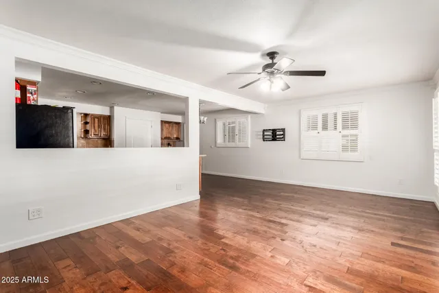 a view of a kitchen with a sink and a stove top oven