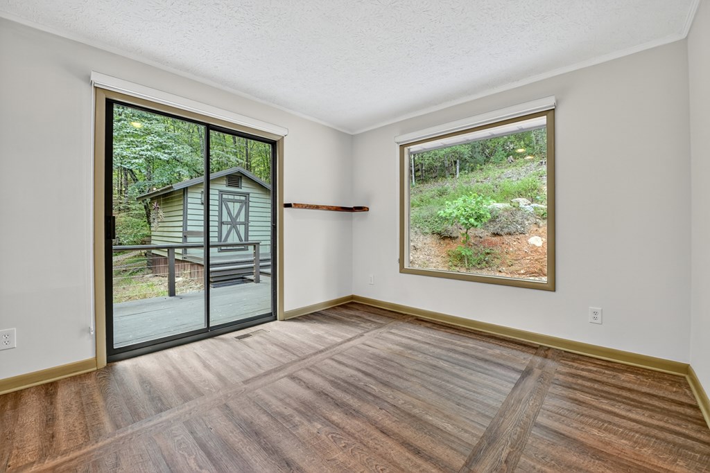 260 Flt Crk Crossing Blue Ridge, GA 30513 - Photo 23 of 64 Guest Bedroom w/Large Sliders