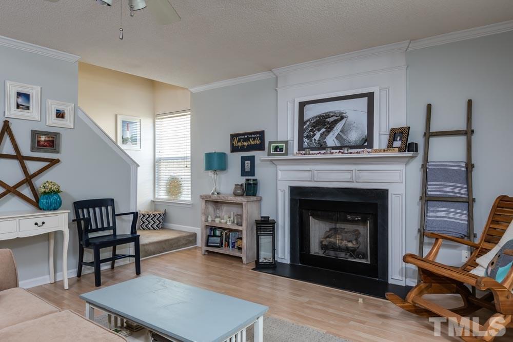 4914 Gable Ridge Drive Durham, NC 27713 - Photo 14 of 23 a living room with furniture and a fireplace