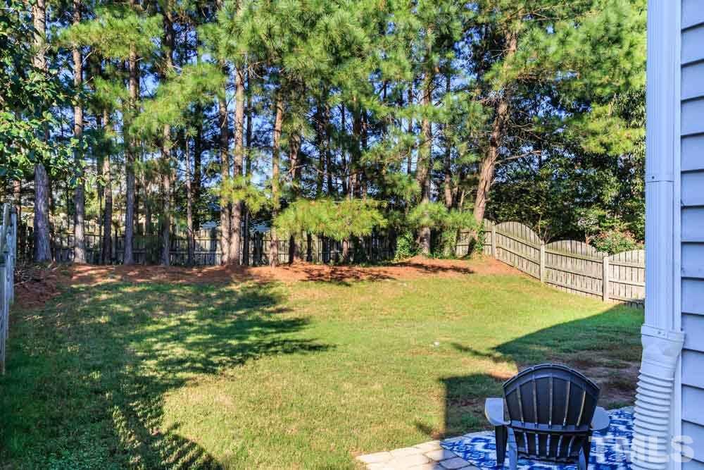 4914 Gable Ridge Drive Durham, NC 27713 - Photo 4 of 23 a view of an chairs and table in the yard