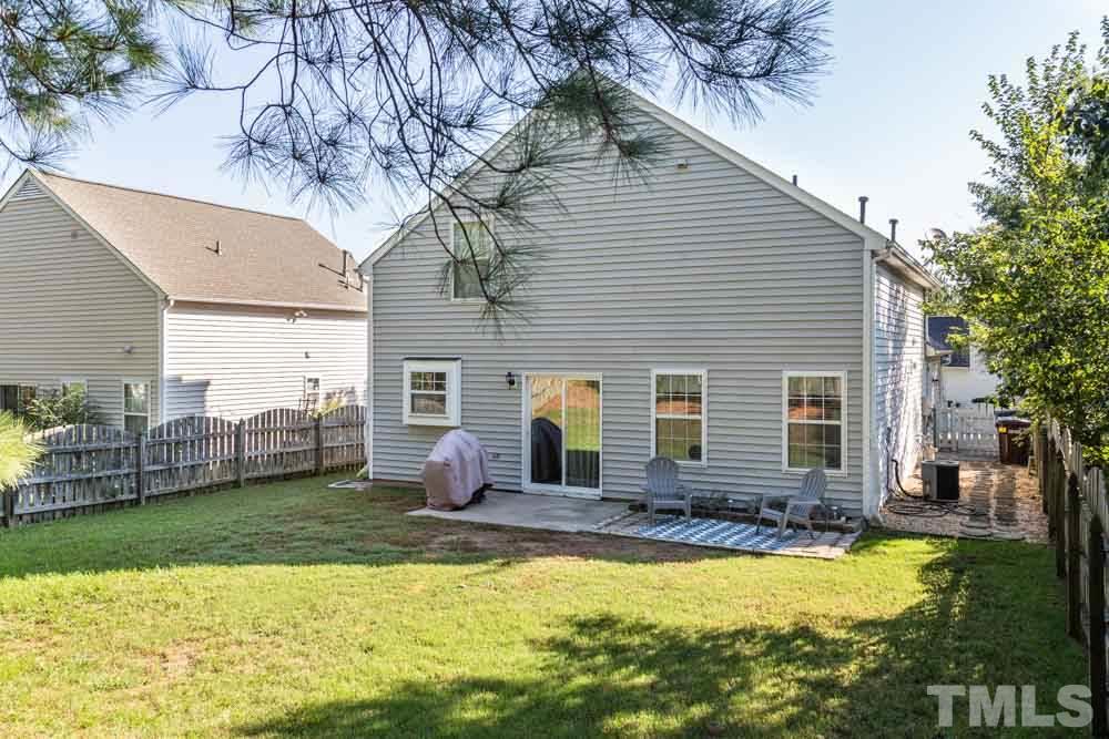 4914 Gable Ridge Drive Durham, NC 27713 - Photo 5 of 23 a view of a house with swimming pool and a yard