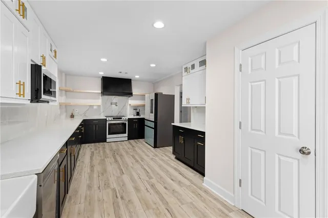 a room with furniture and pool table