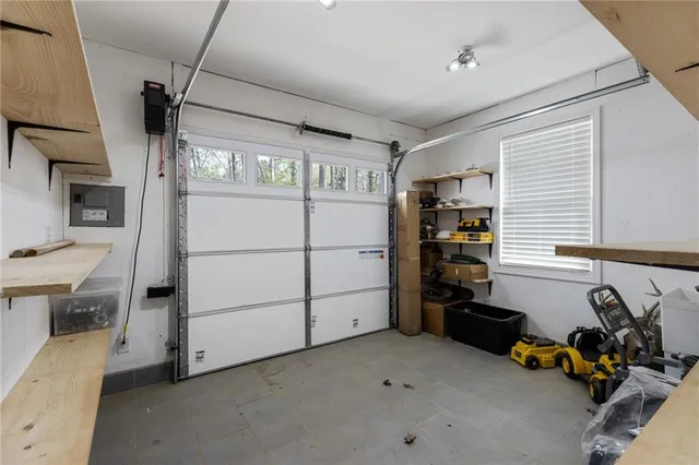 a yellow house with trees in front of it