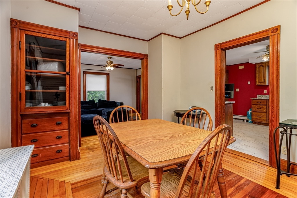 54 Charles Street Gardner, MA 01440 - Photo 17 of 40 a dining room with furniture and a window