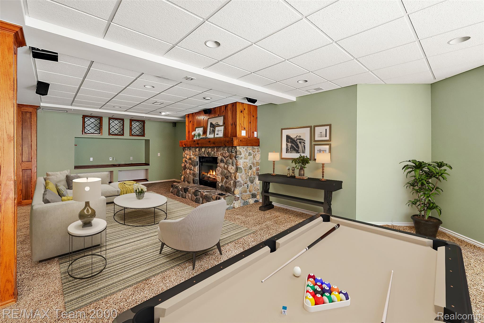 630 Sheldon Court Rochester, MI 48306 - Photo 70 of 94 Playroom featuring a paneled ceiling, a stone fireplace, and billiards table