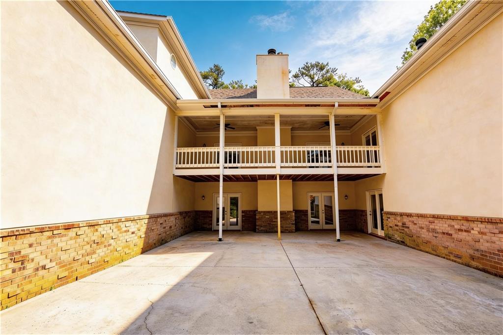 10060 Buice Road Alpharetta, GA 30022 - Photo 12 of 75 a view of house with outdoor space