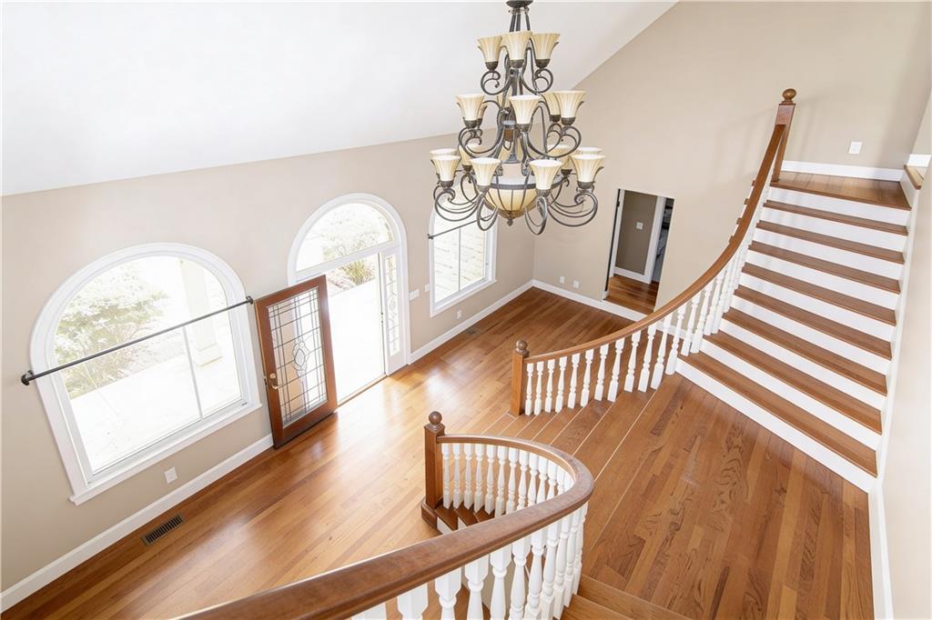 10060 Buice Road Alpharetta, GA 30022 - Photo 17 of 75 a view of entryway with wooden floor