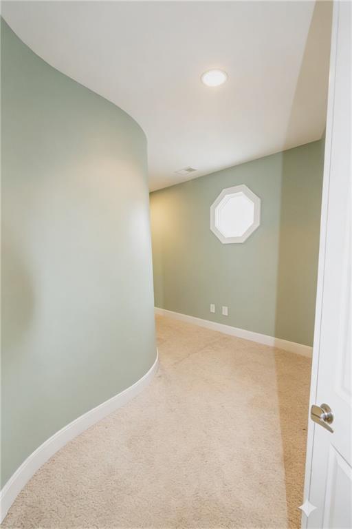 10060 Buice Road Alpharetta, GA 30022 - Photo 47 of 75 a view of a room with a projector