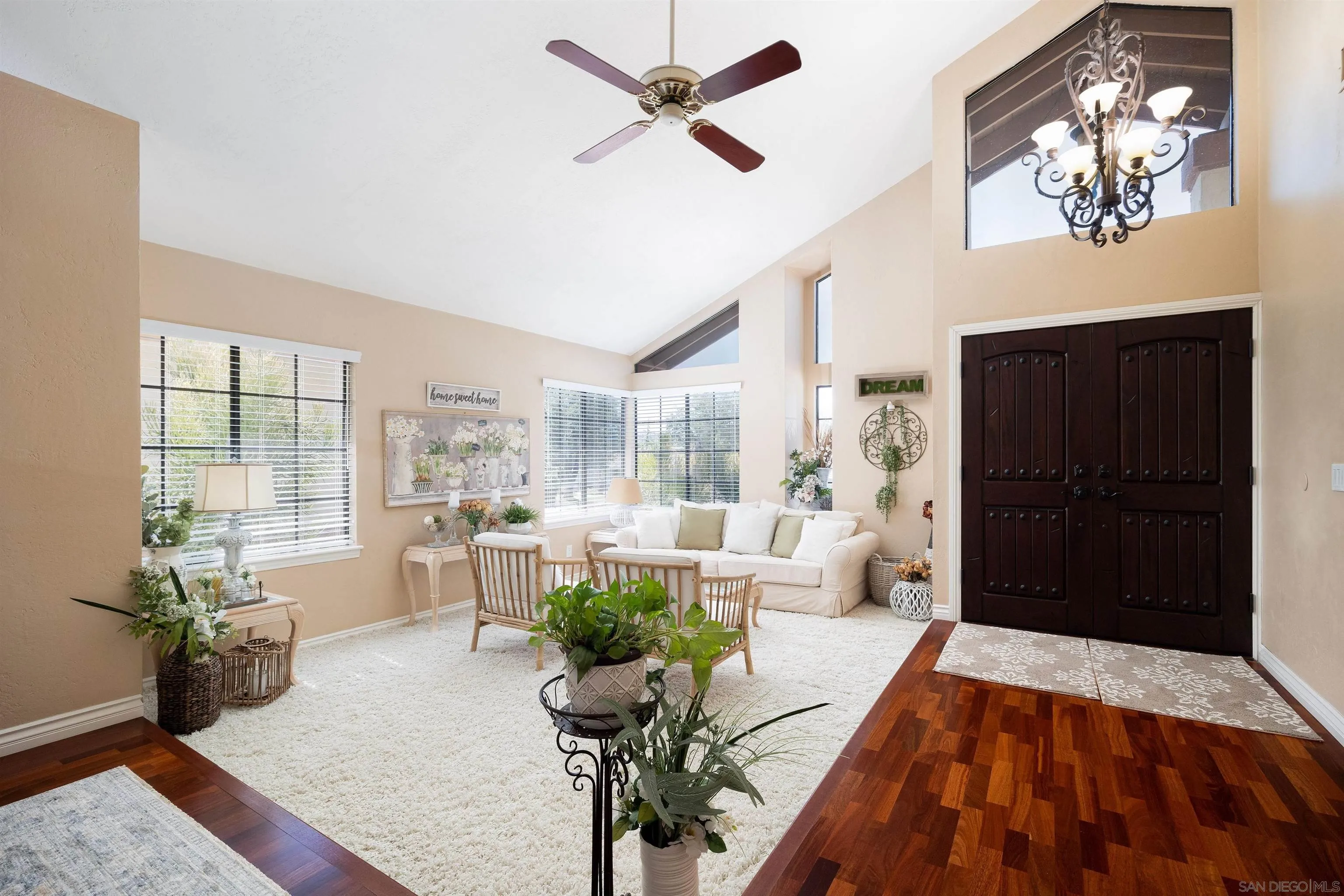 14064 Old Station Road Poway, CA 92064 - Photo 2 of 2 a living room with furniture potted plant and a window