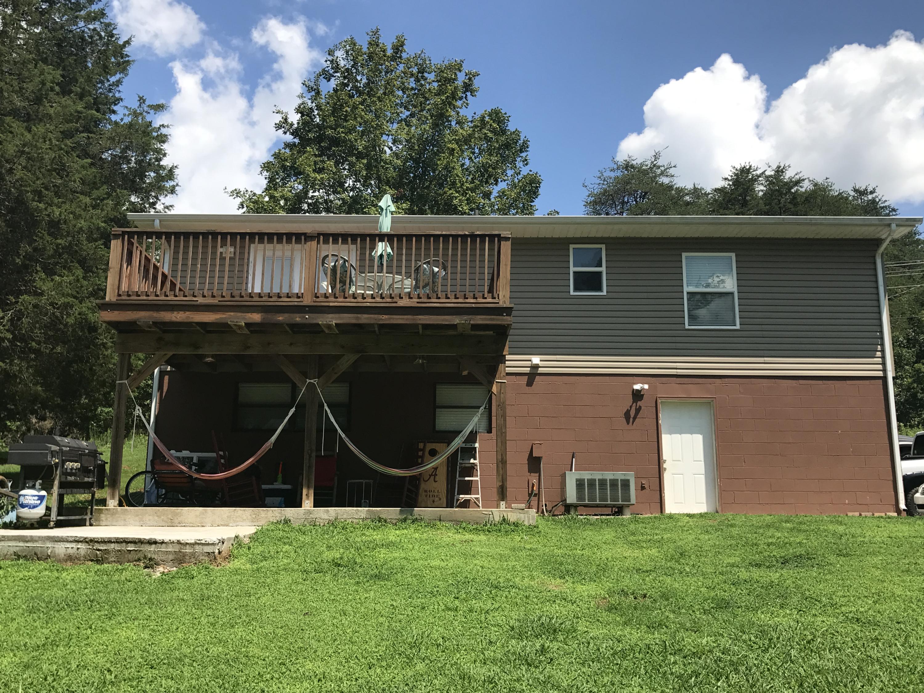 3427 Ralph Phelps Road Louisville, TN 37777 - Photo 12 of 34 Hammocks under back deck