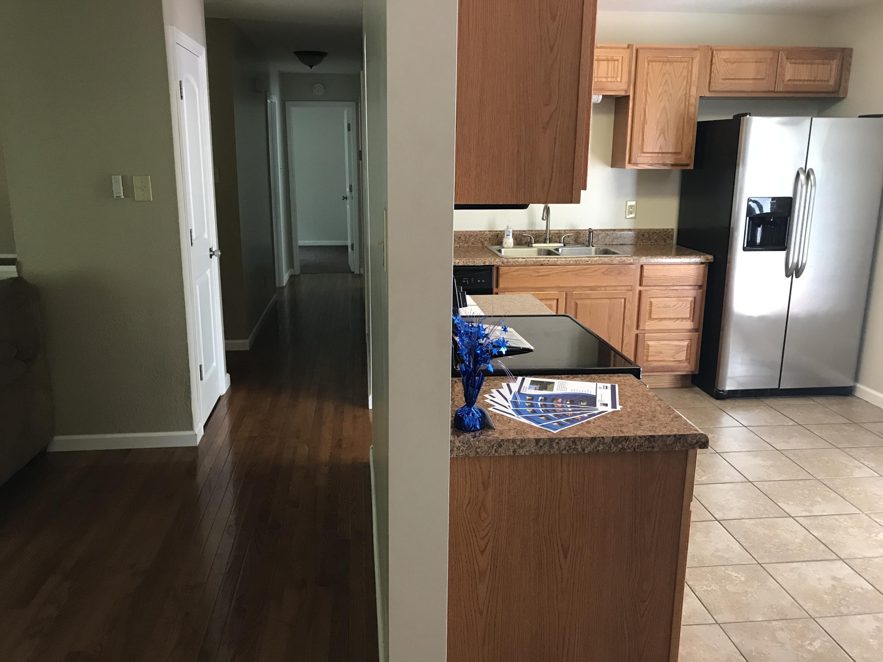 3427 Ralph Phelps Road Louisville, TN 37777 - Photo 16 of 34 LR on left, kitchen on Rt, view of hall