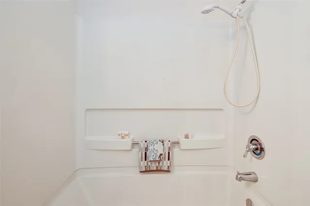 a bathroom with a bathtub