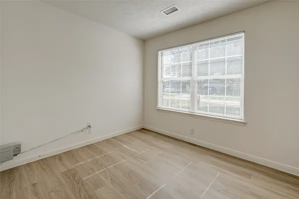 an empty room with a window