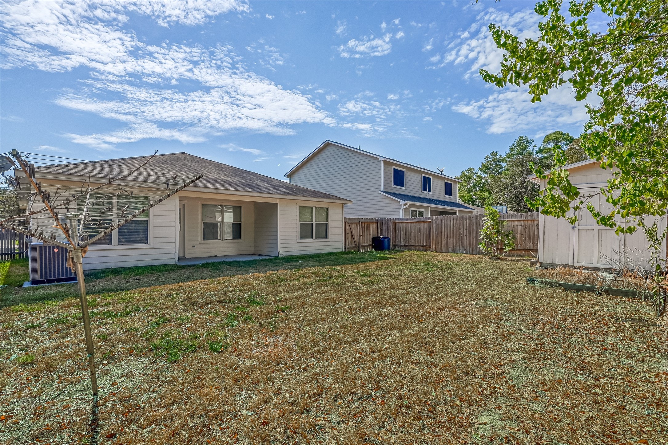 4830 Comal River Loop Spring, TX 77386 - Photo 40 of 43 a view of a house with a yard