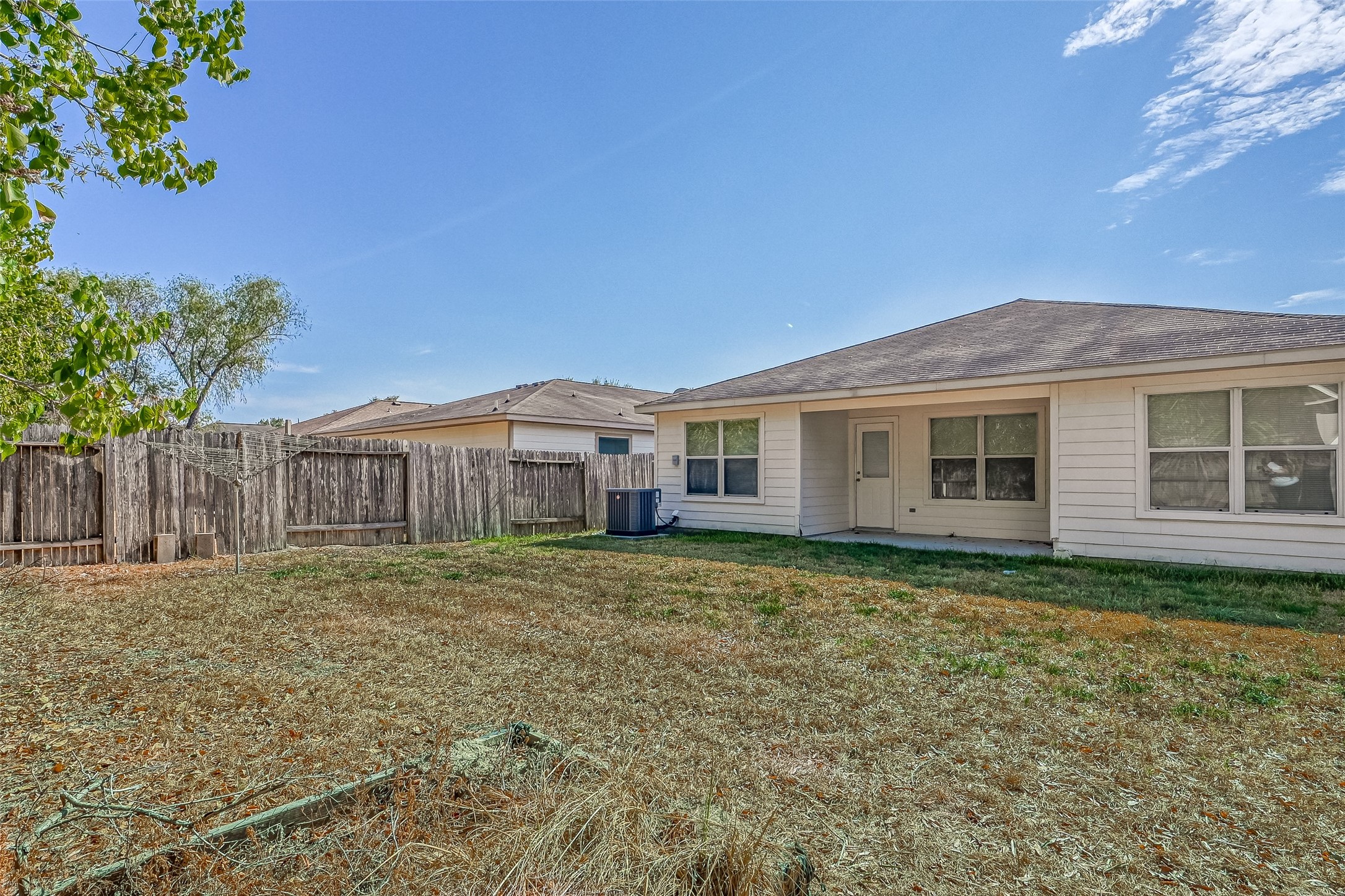 4830 Comal River Loop Spring, TX 77386 - Photo 42 of 43 a view of a yard in front of a house with large trees