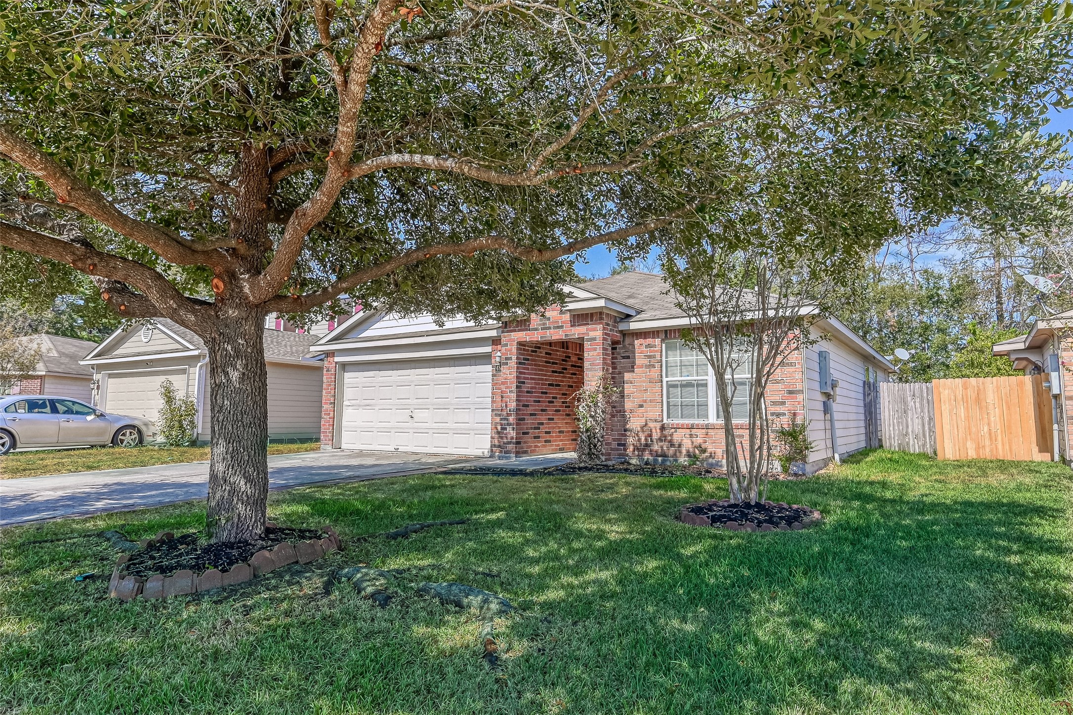 4830 Comal River Loop Spring, TX 77386 - Photo 6 of 43 a front view of house with yard and green space
