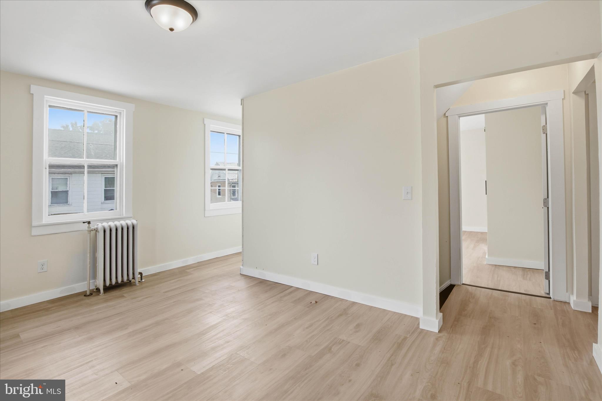 101 East Lincoln Avenue Lititz, PA 17543 - Photo 28 of 39 an empty room with wooden floor and windows