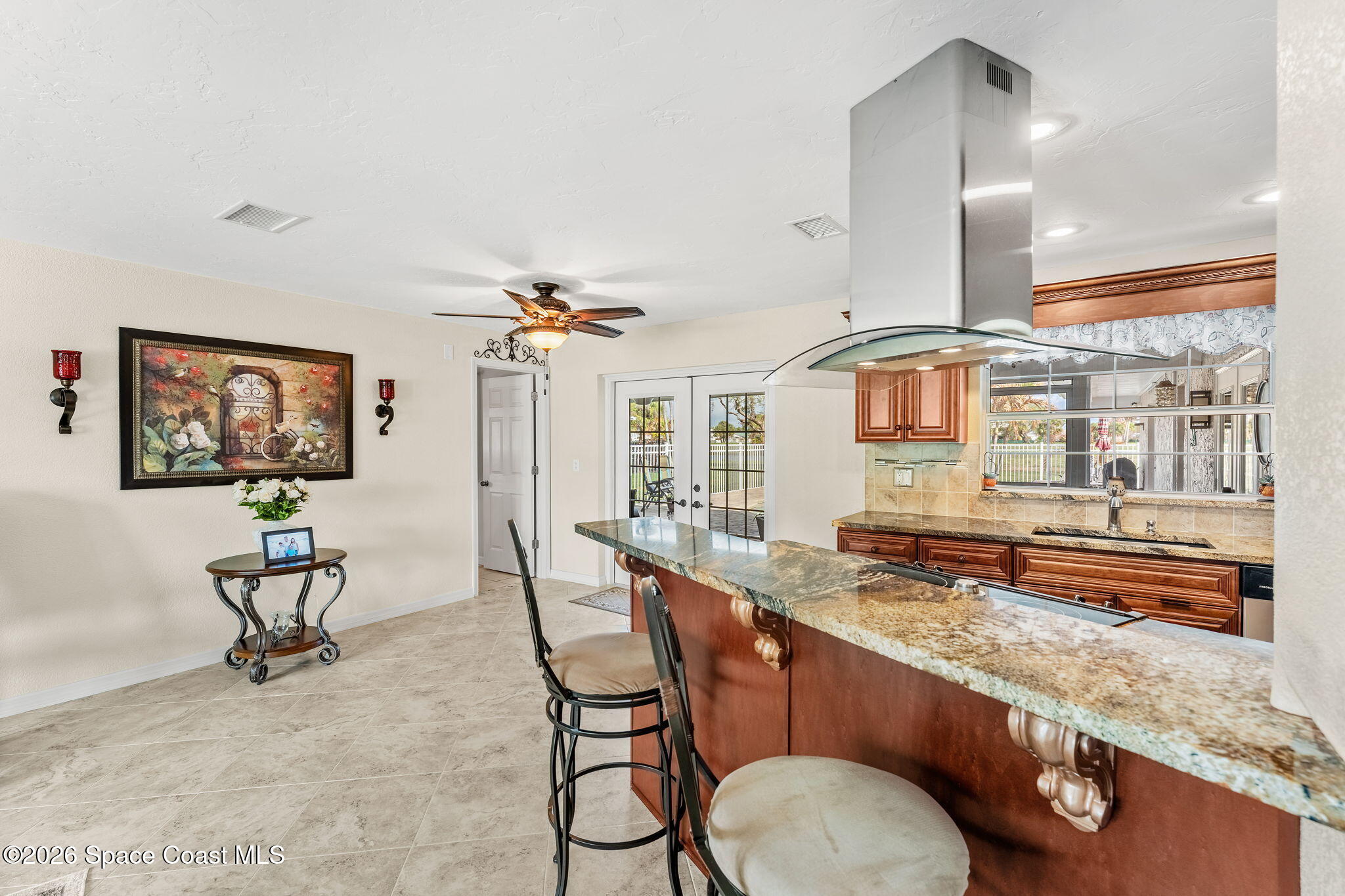 31 Fairway Drive Cocoa Beach, FL 32931 - Photo 11 of 53 a living room with furniture and a wooden floor