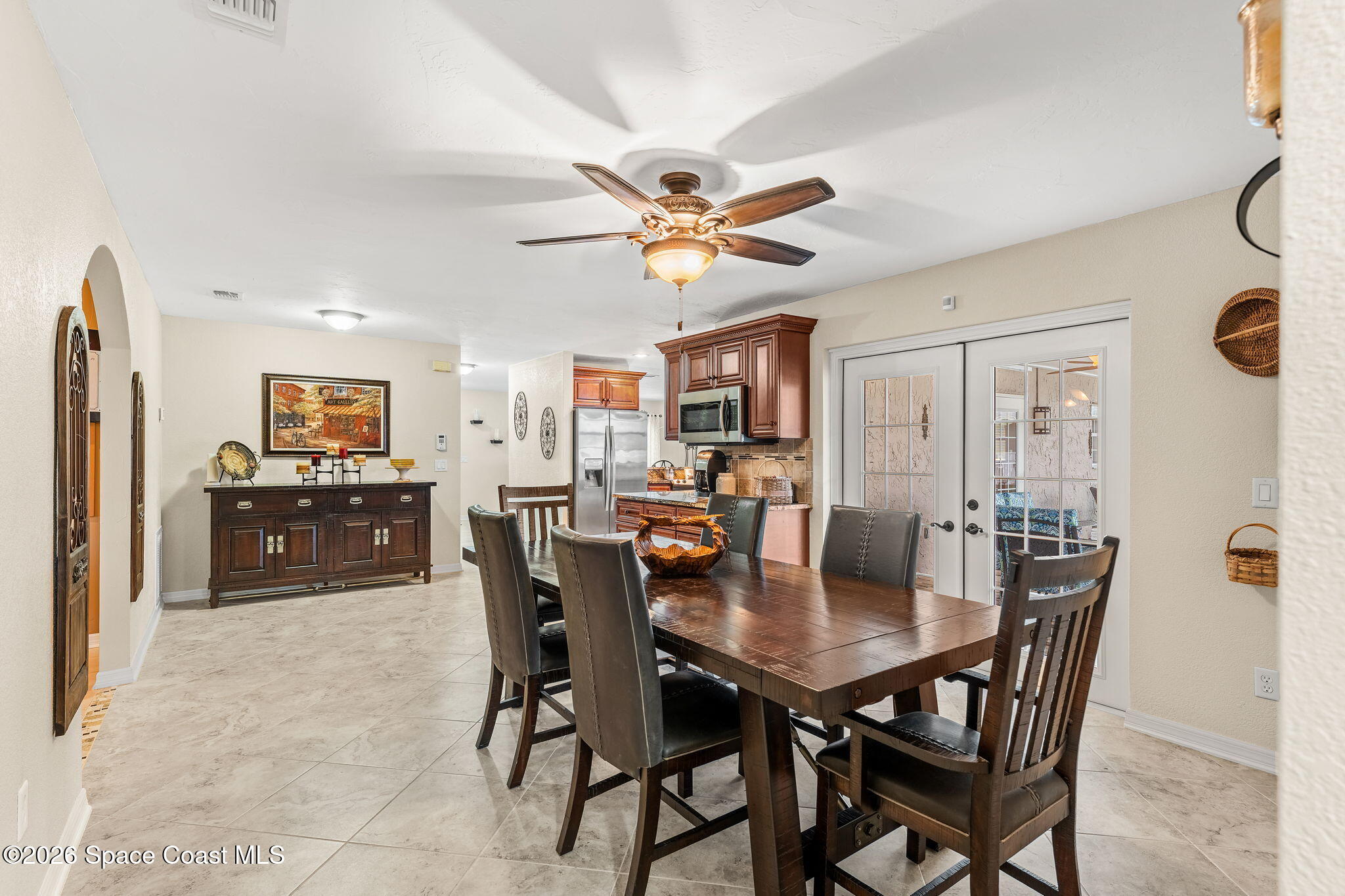 31 Fairway Drive Cocoa Beach, FL 32931 - Photo 20 of 53 a dining room with furniture and window